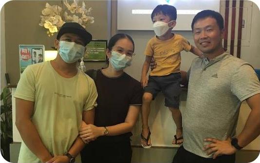 Mary Louise Marquez and family with Dr. Kaz